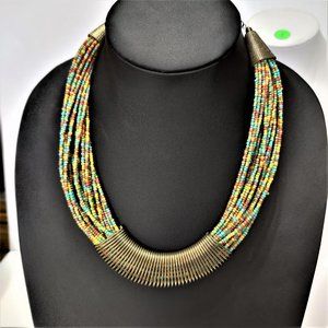 BEADED NECKLACE WITH METAL ACCENTS